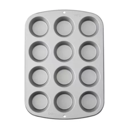 Molde de Aluminio para Muffins, 12 Cavidades WILTON 2105-954